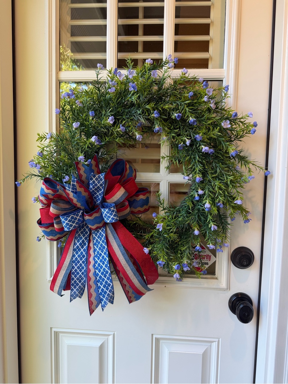 Green Holiday Wreath with Red & Blue Patriotic Bow